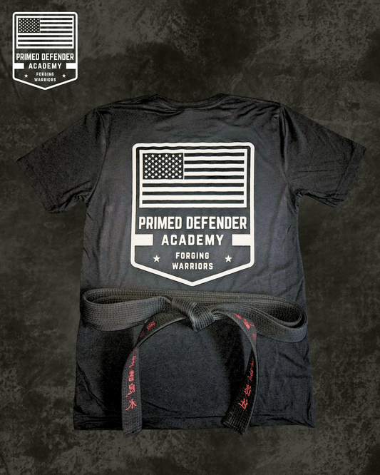 Primed Defender Academy Logo Tee